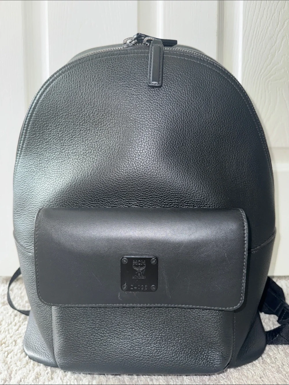 MCM Black Leather Backpack with Front Flap Pocket